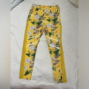 EUC ZYIA Size 6-8 Yellow Floral Reflective Leggings